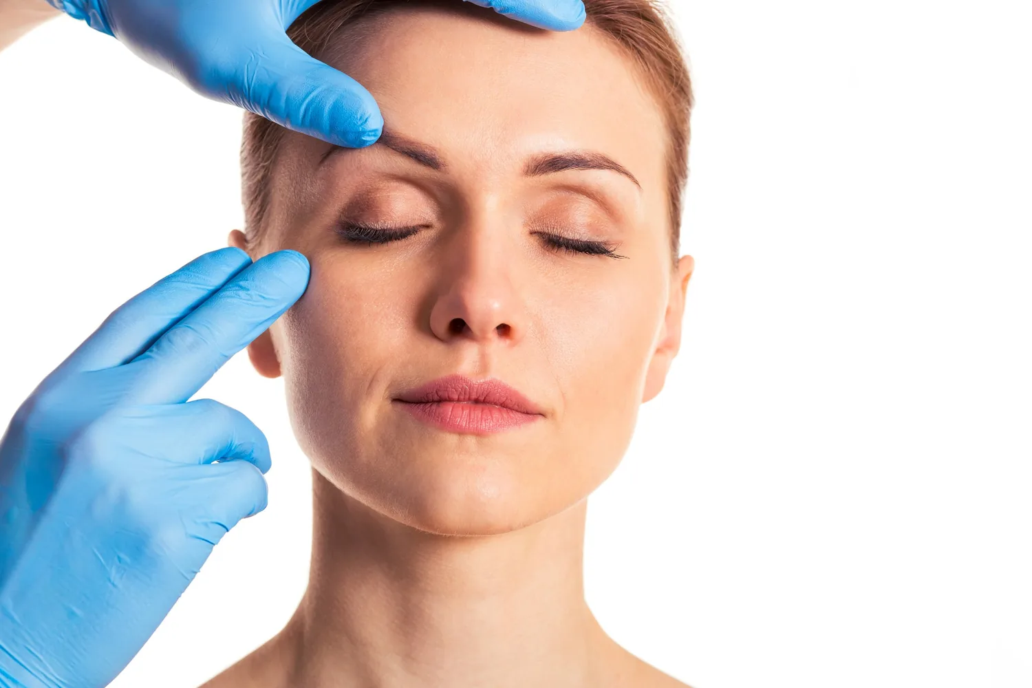 medical dermatology woman dermatologist-examining-female-patients-face-from-thermage-treatment